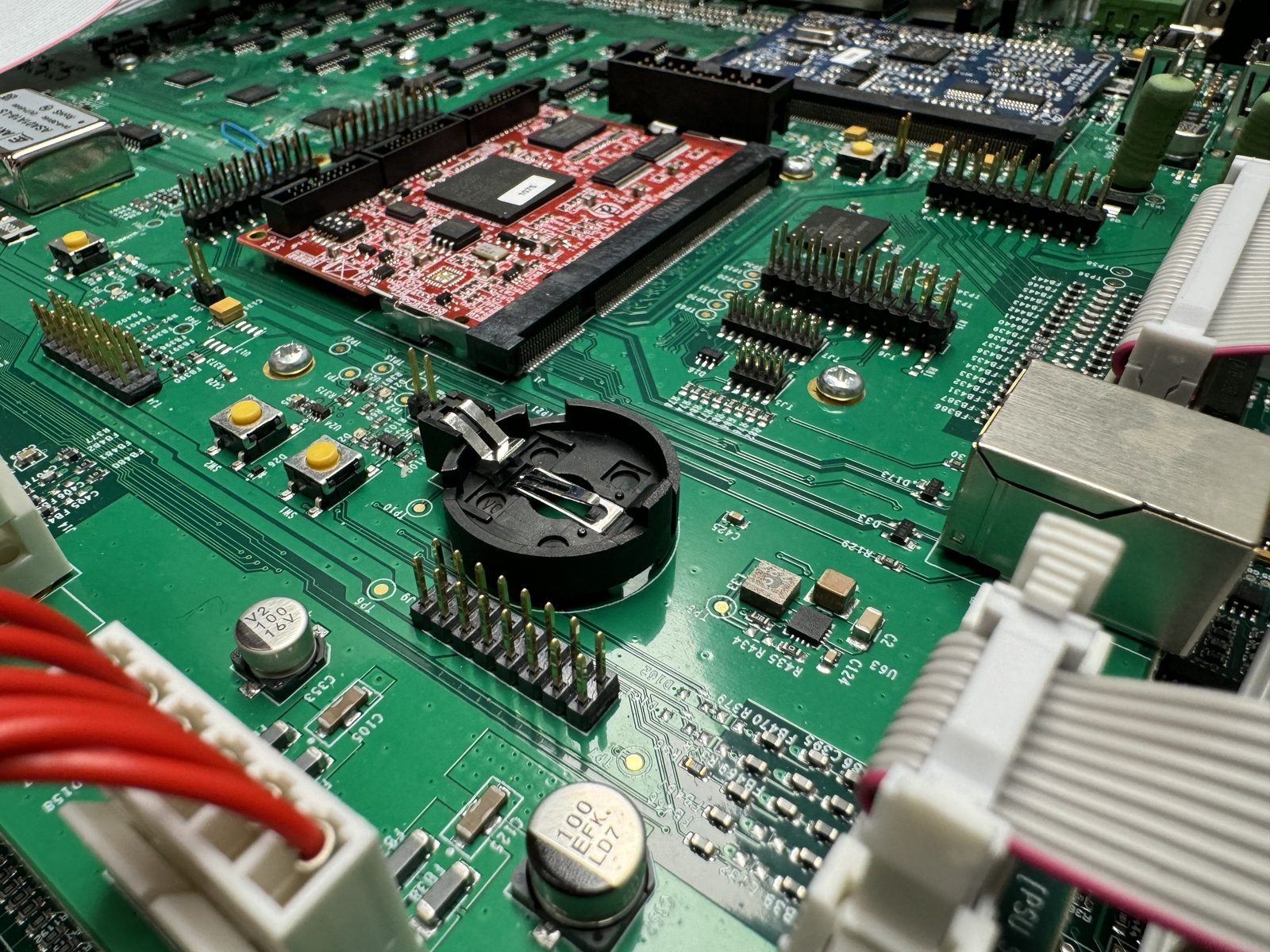 Mixed-technology printed circuit board with surface-mount and through-hole components