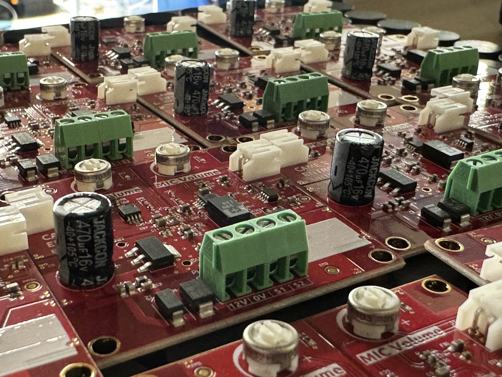 Through-hole components on populated printed circuit boards